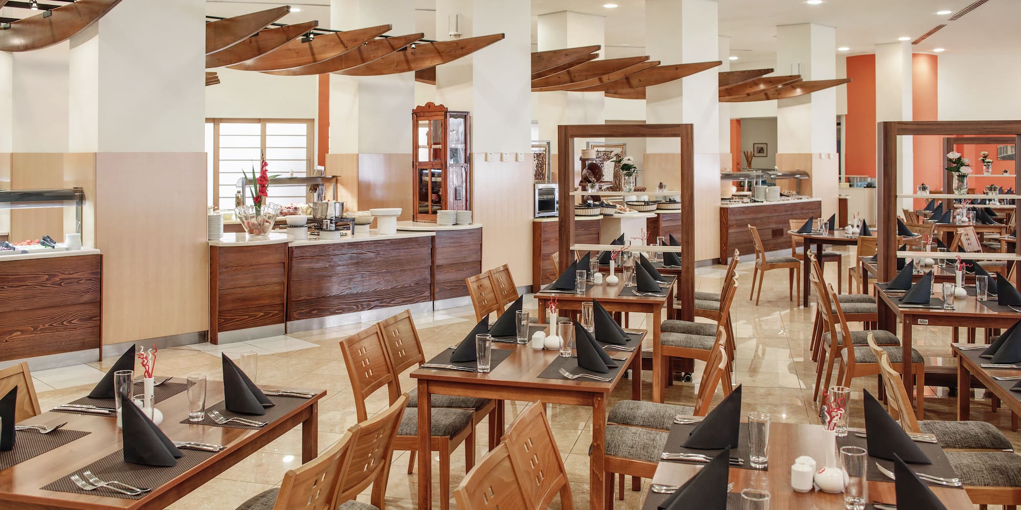 a restaurant with tables and chairs