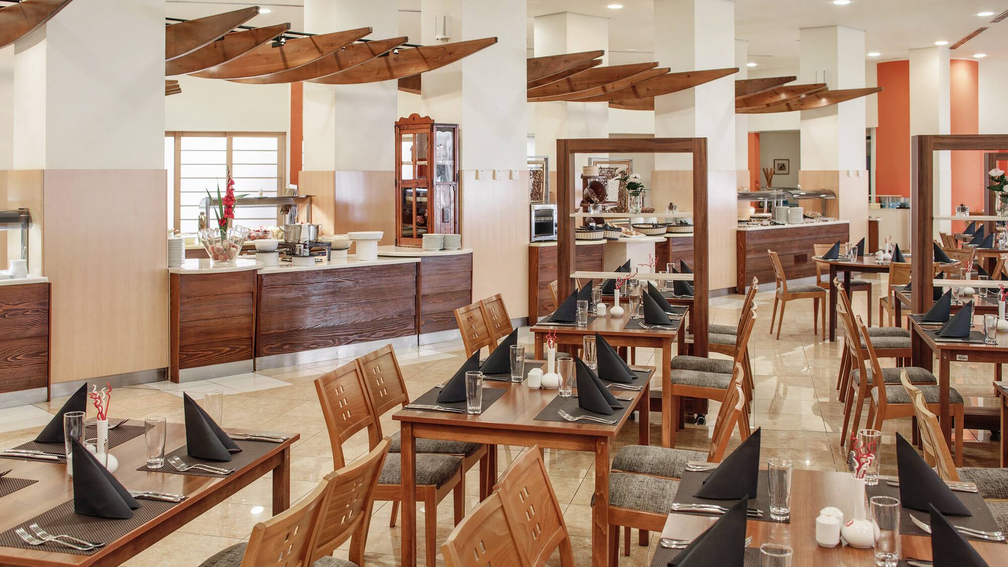 a restaurant with tables and chairs