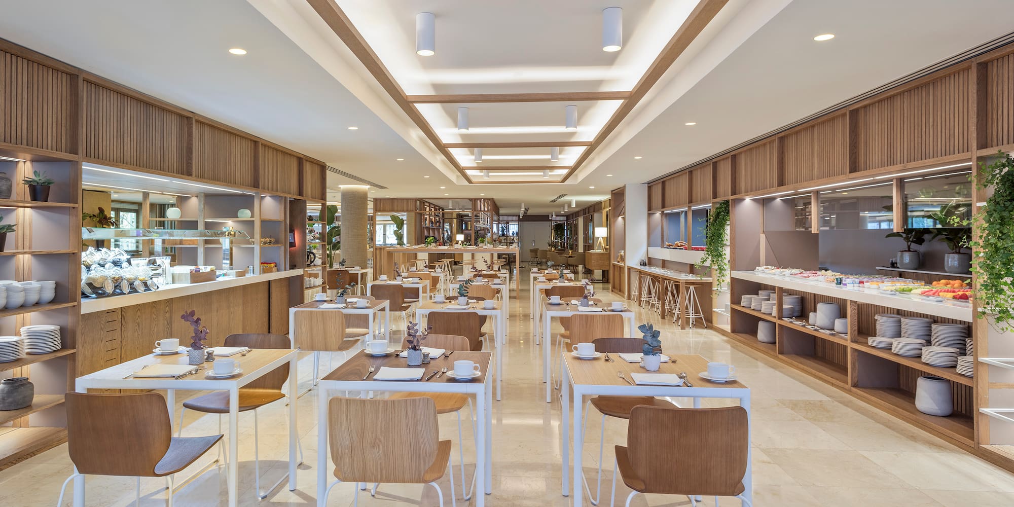 a restaurant with tables and chairs