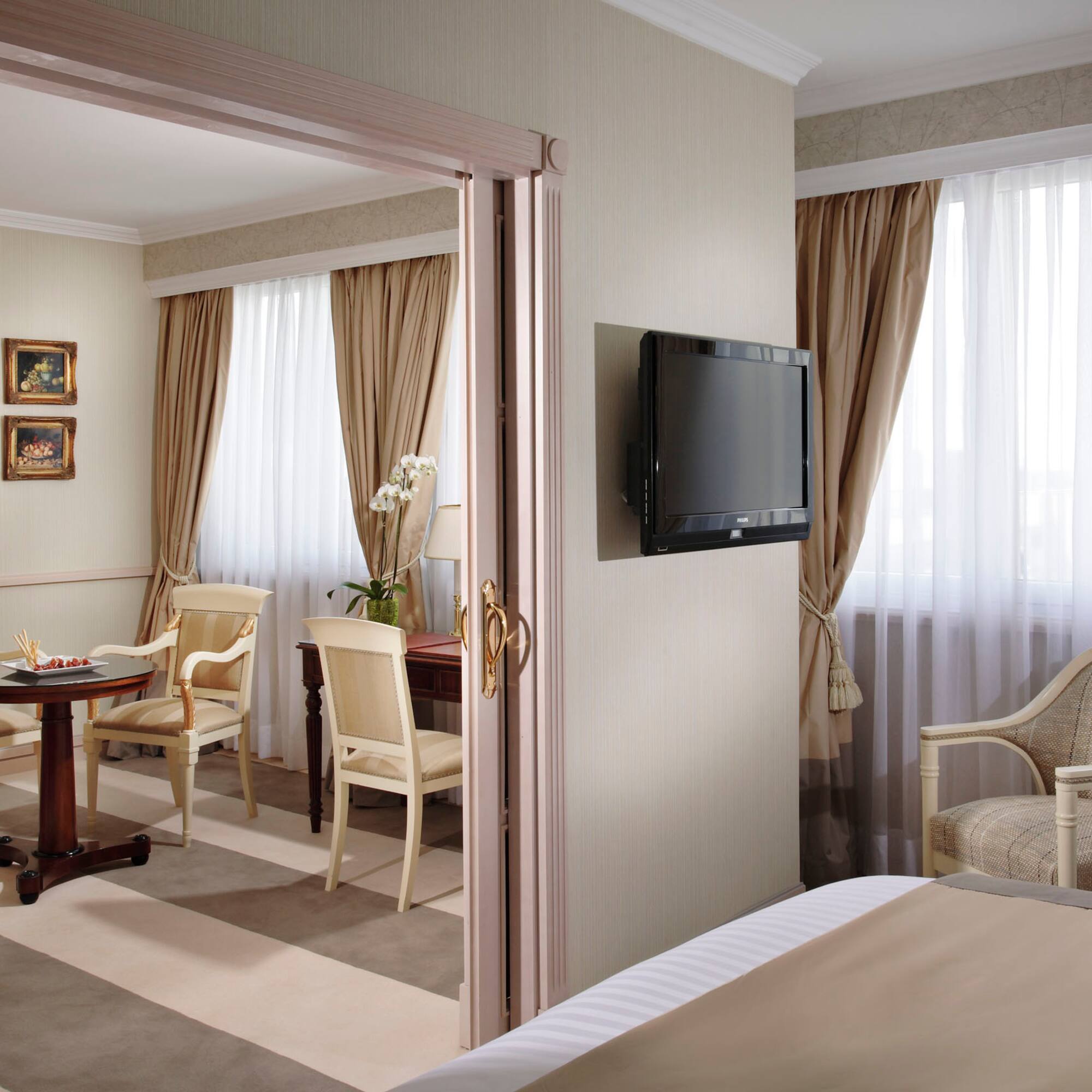 a room with a tv and a table