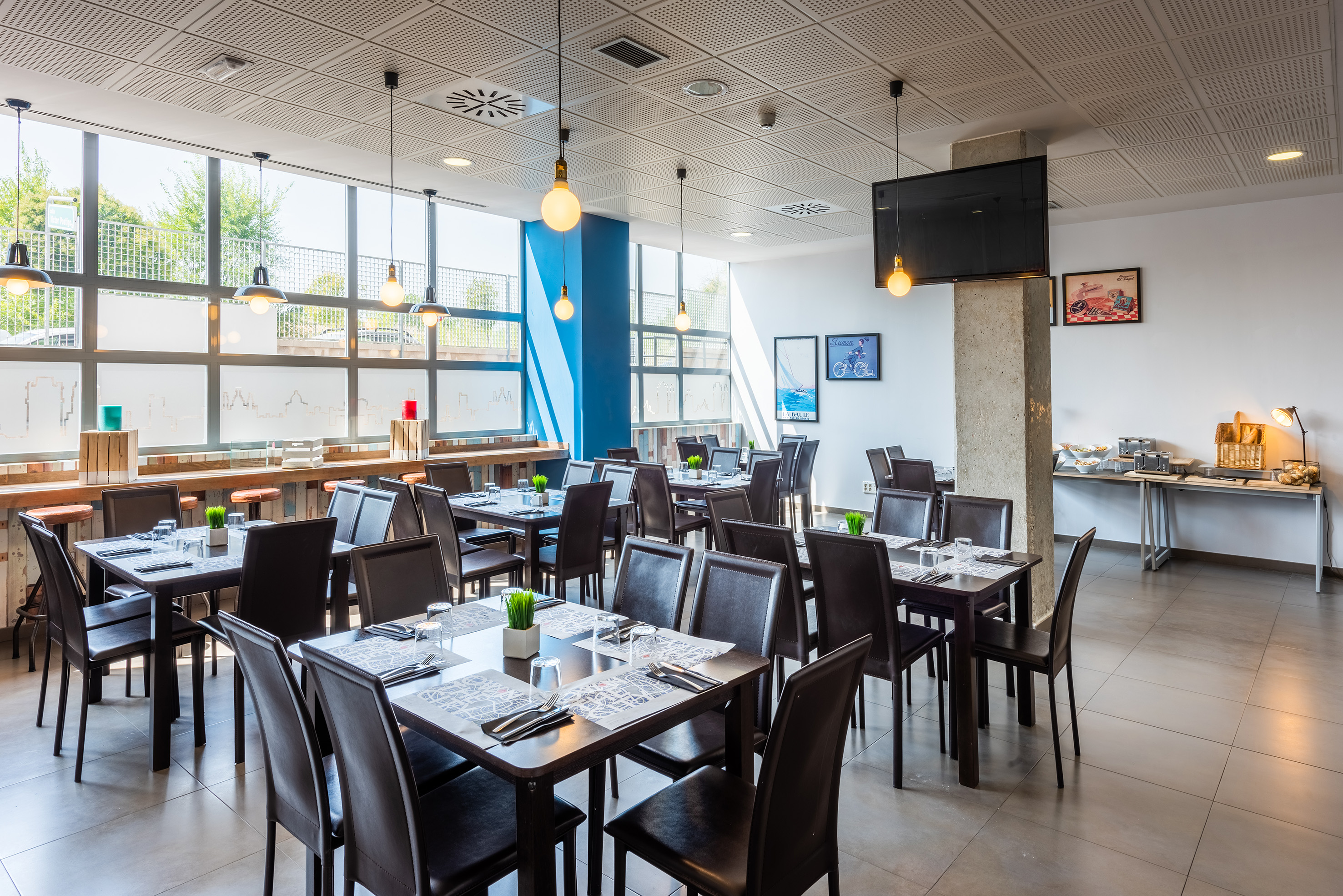 a room with tables and chairs