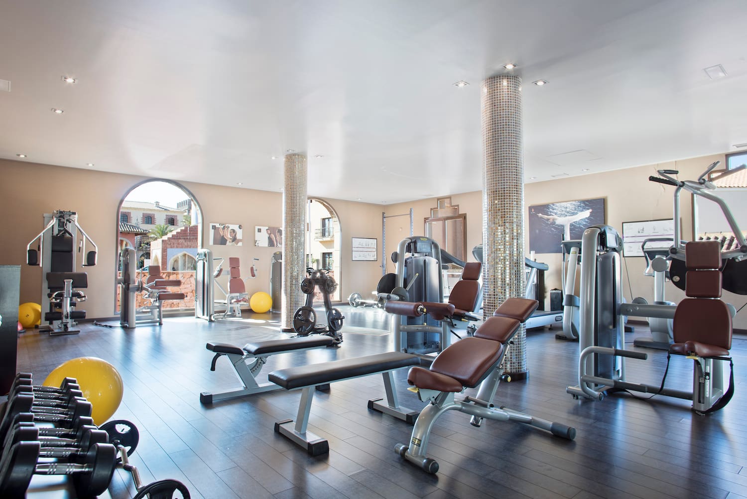 a large gym with exercise equipment