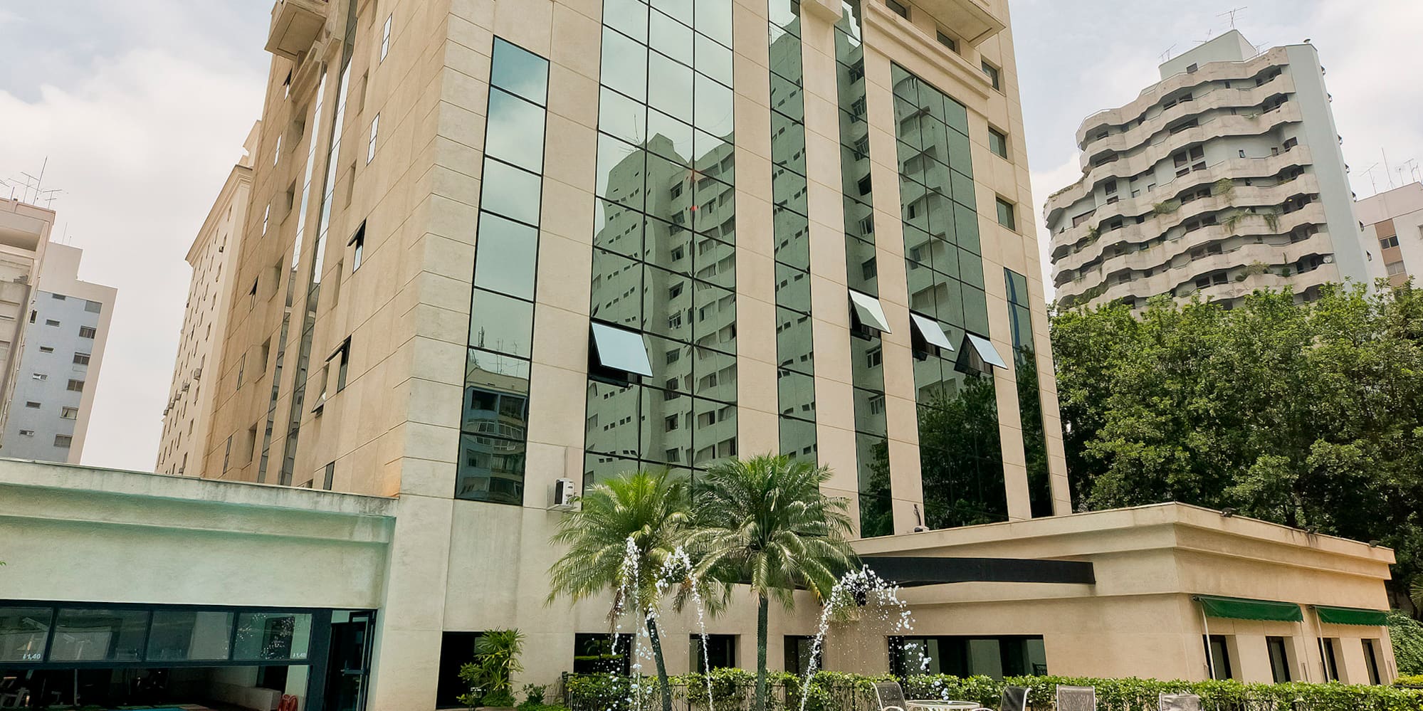 a pool in front of a building