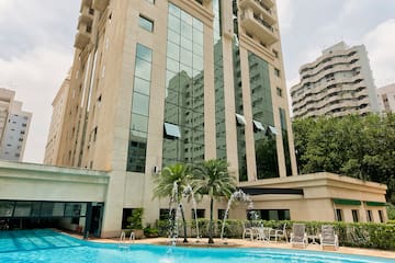 a pool in front of a building