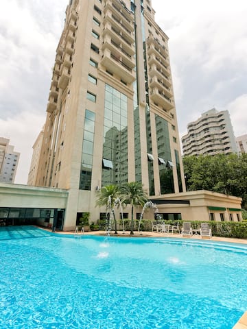 a pool in front of a building