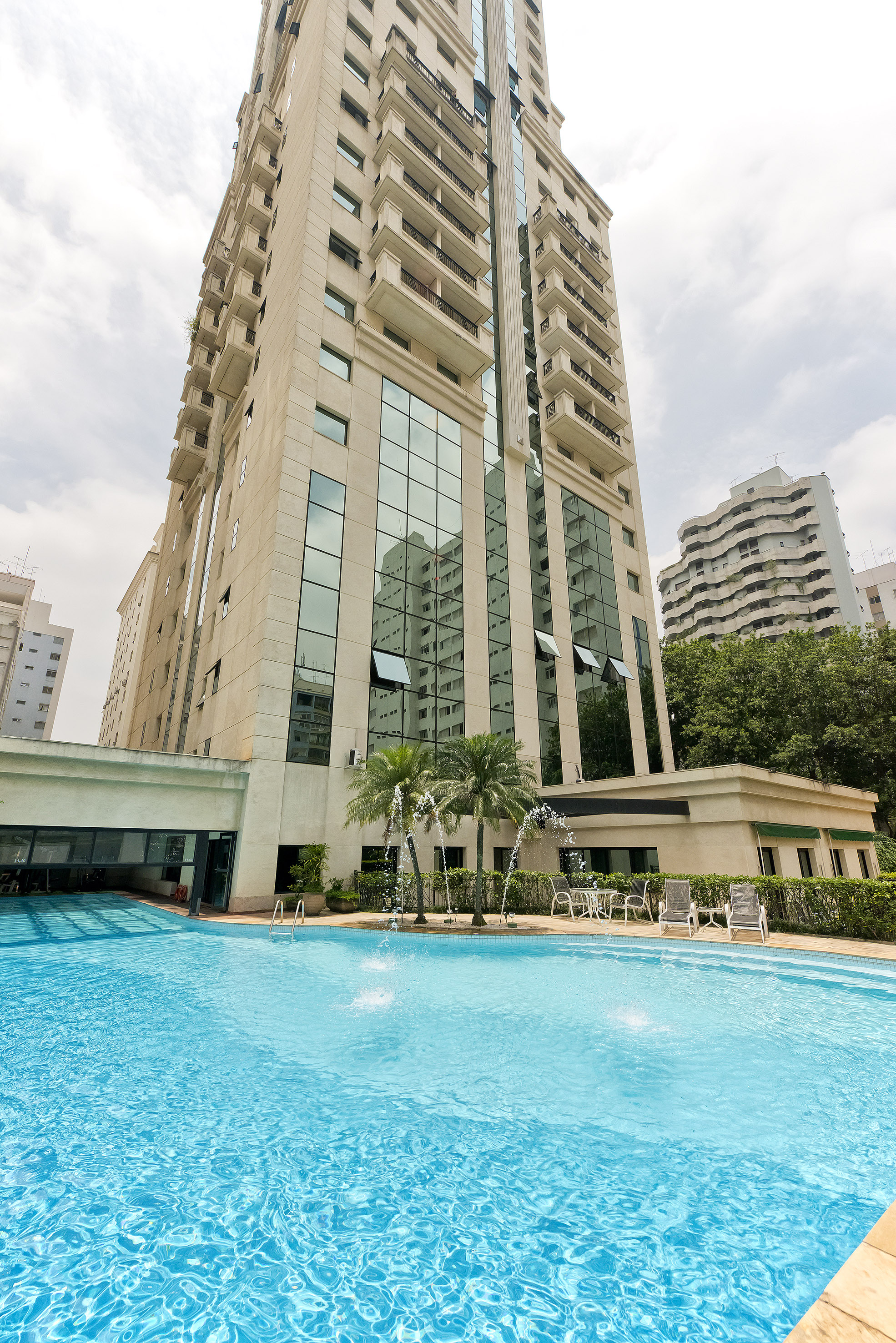 a pool in front of a building