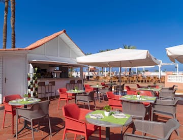 a tables and chairs outside a restaurant