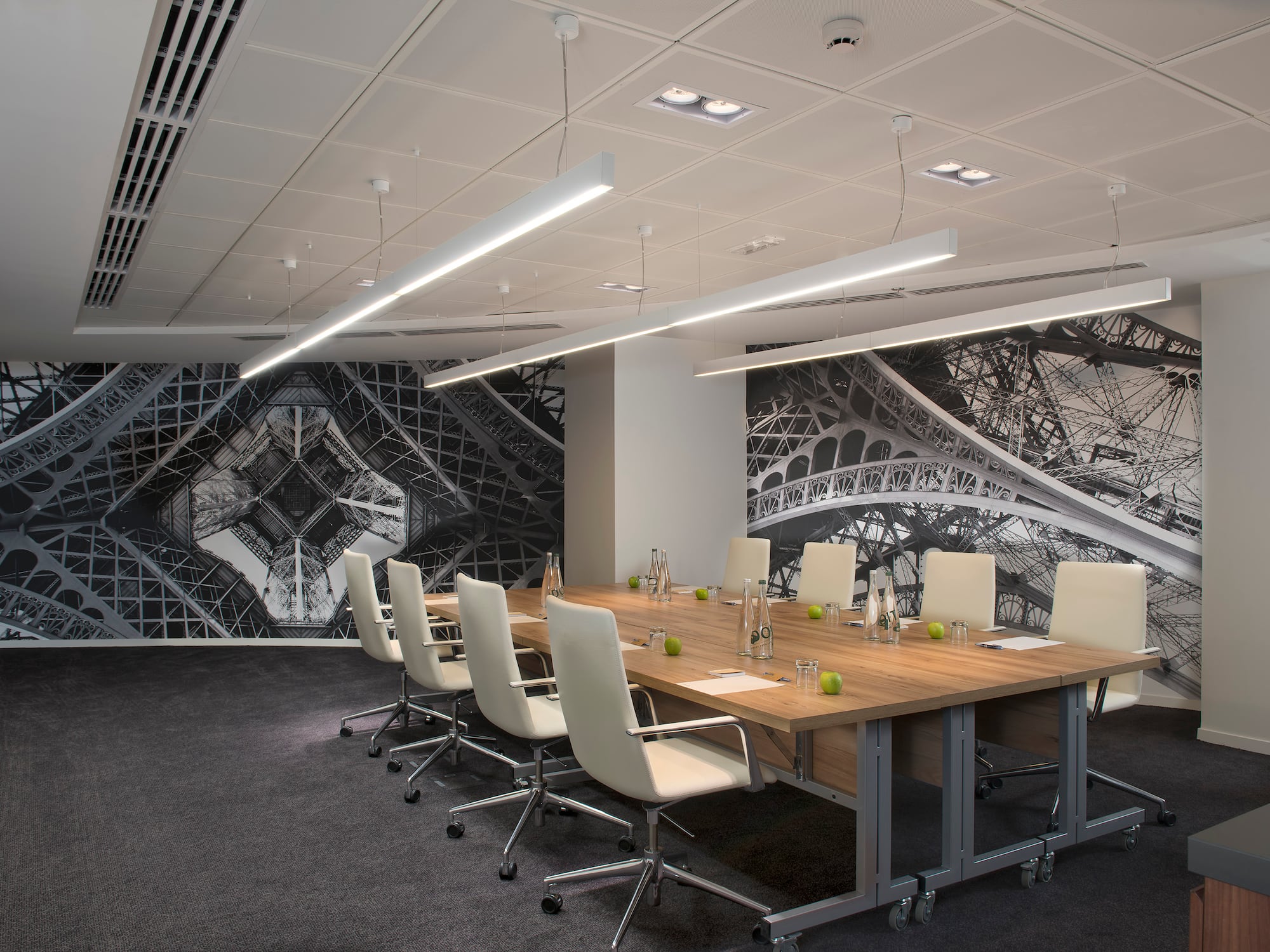 a conference room with a table and chairs.