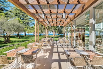 a restaurant with tables and chairs