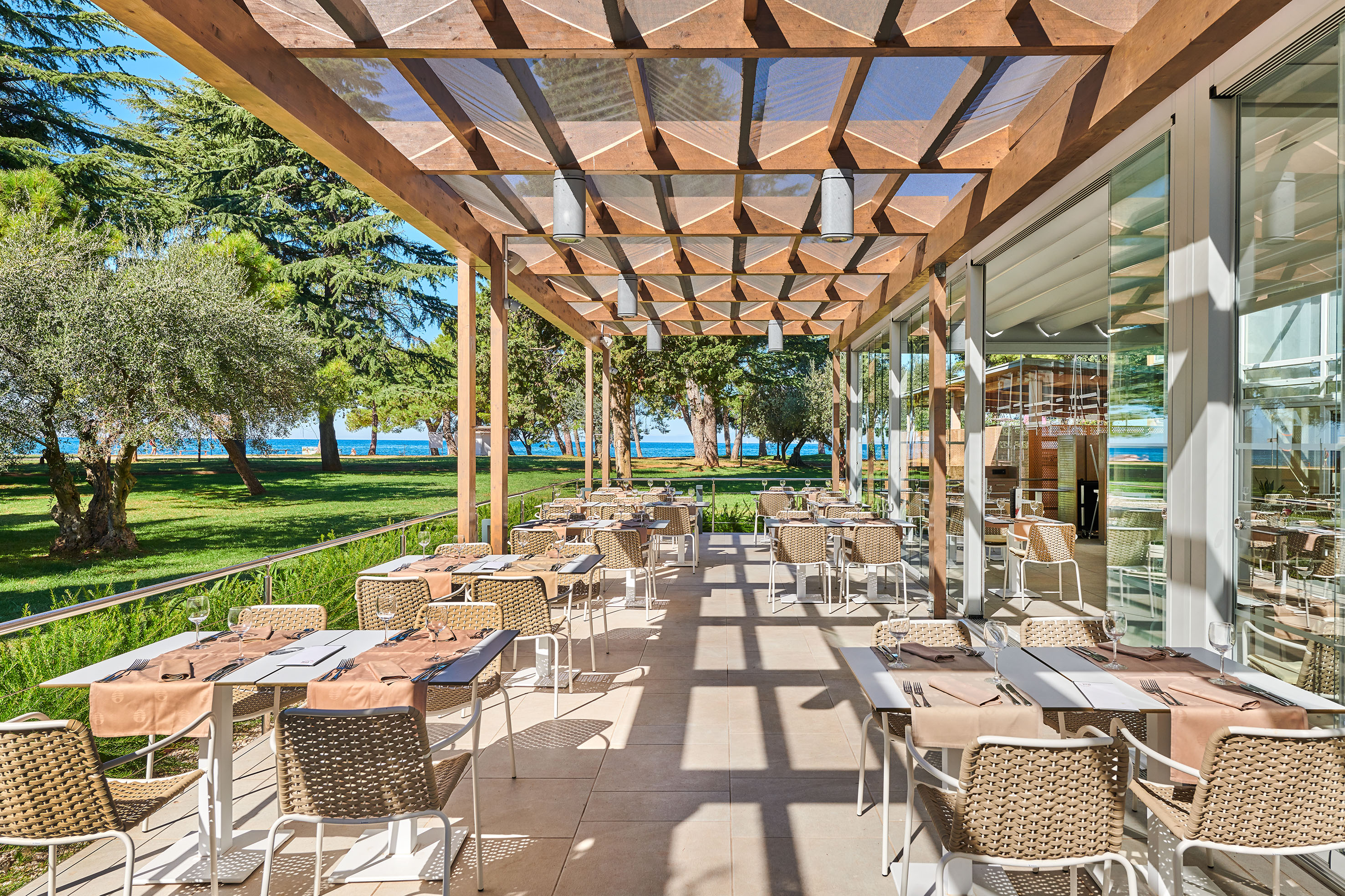 a restaurant with tables and chairs