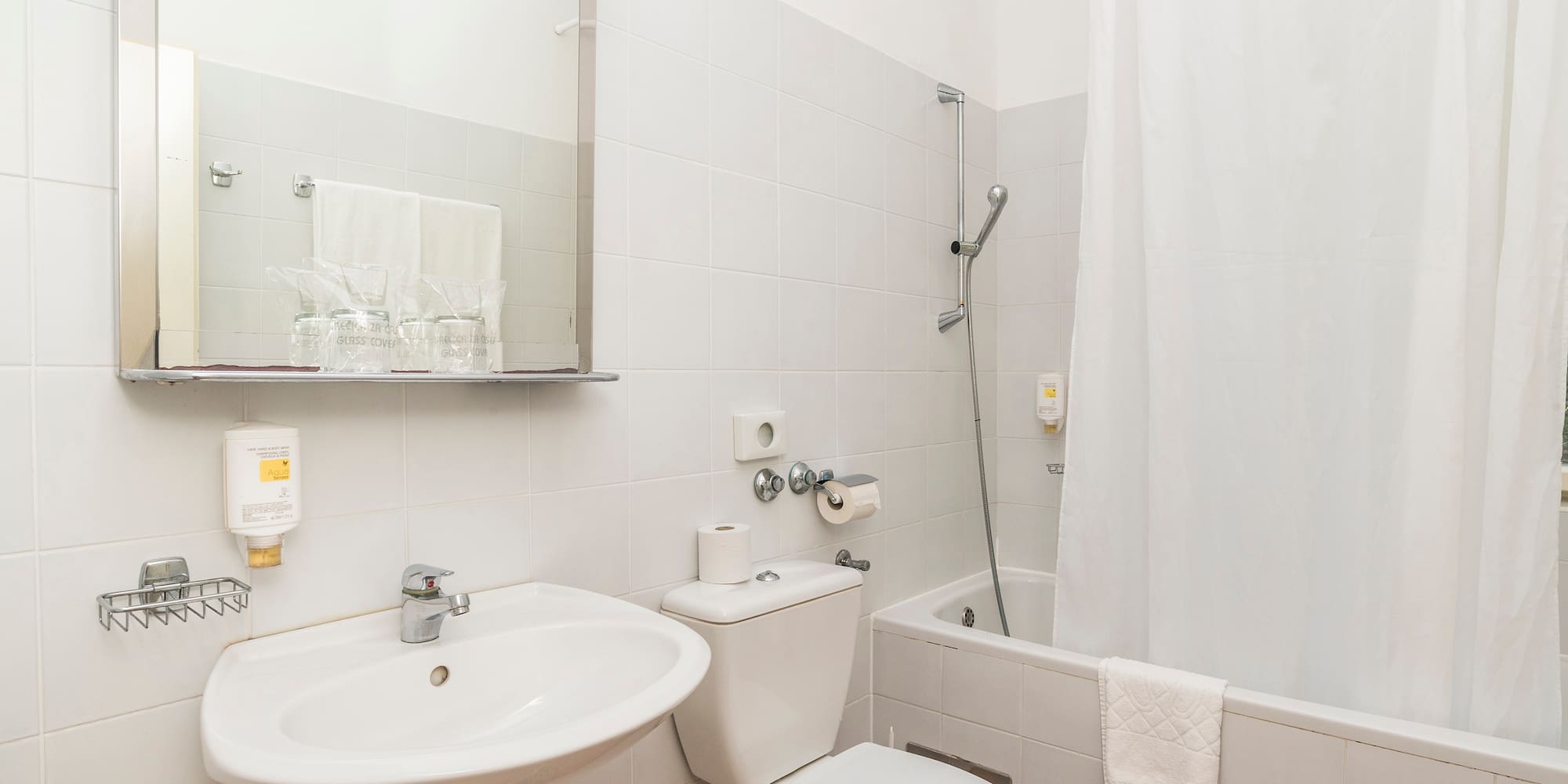 a bathroom with a sink and toilet