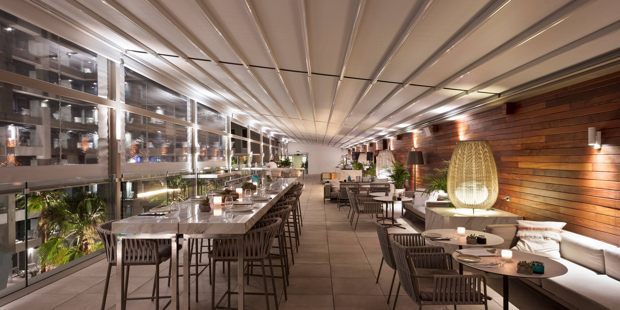 a restaurant with tables and chairs