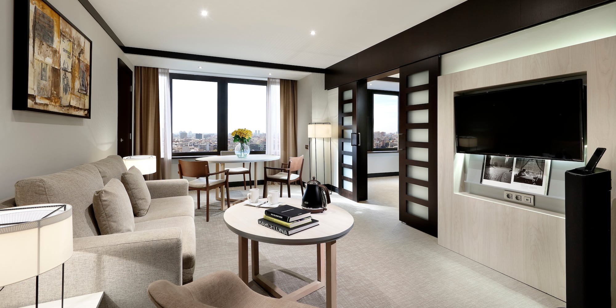 a living room with a television and a couch