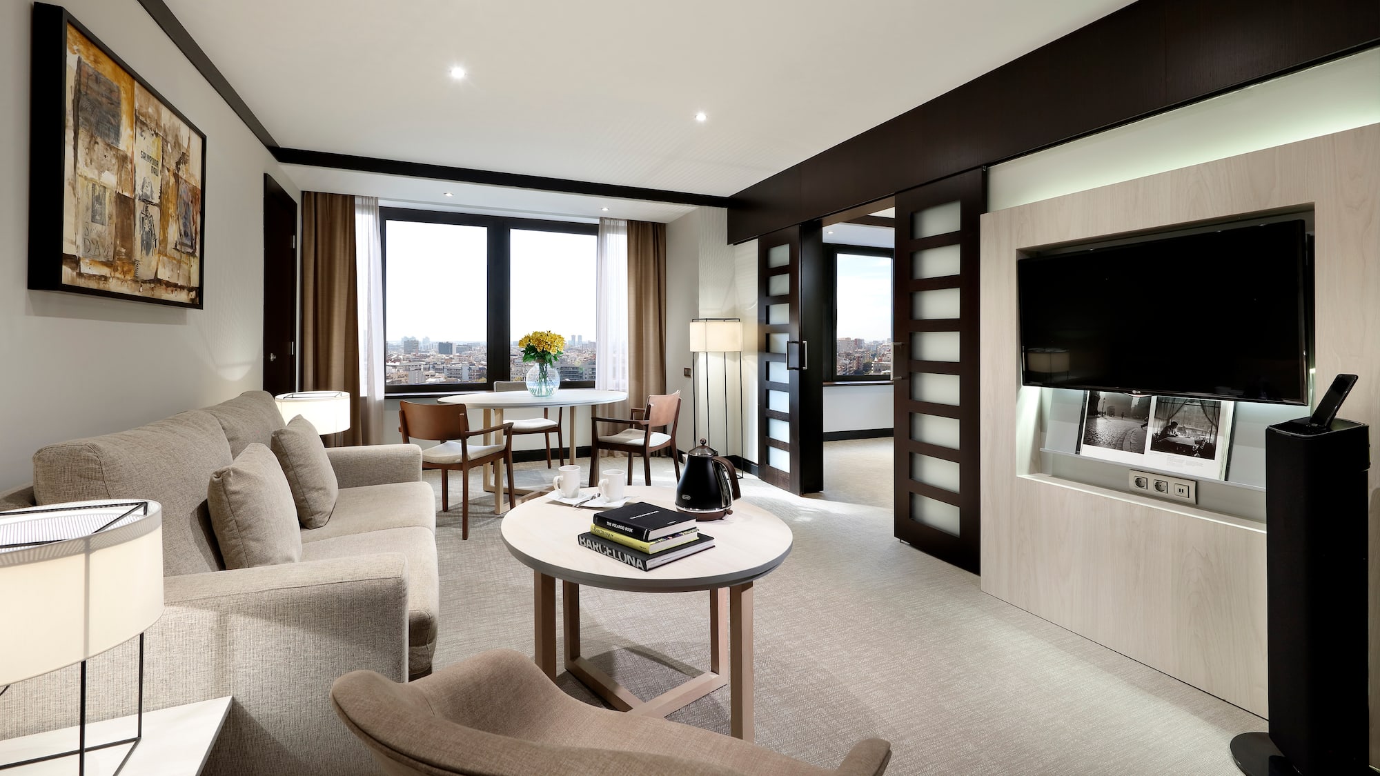 a living room with a television and a couch