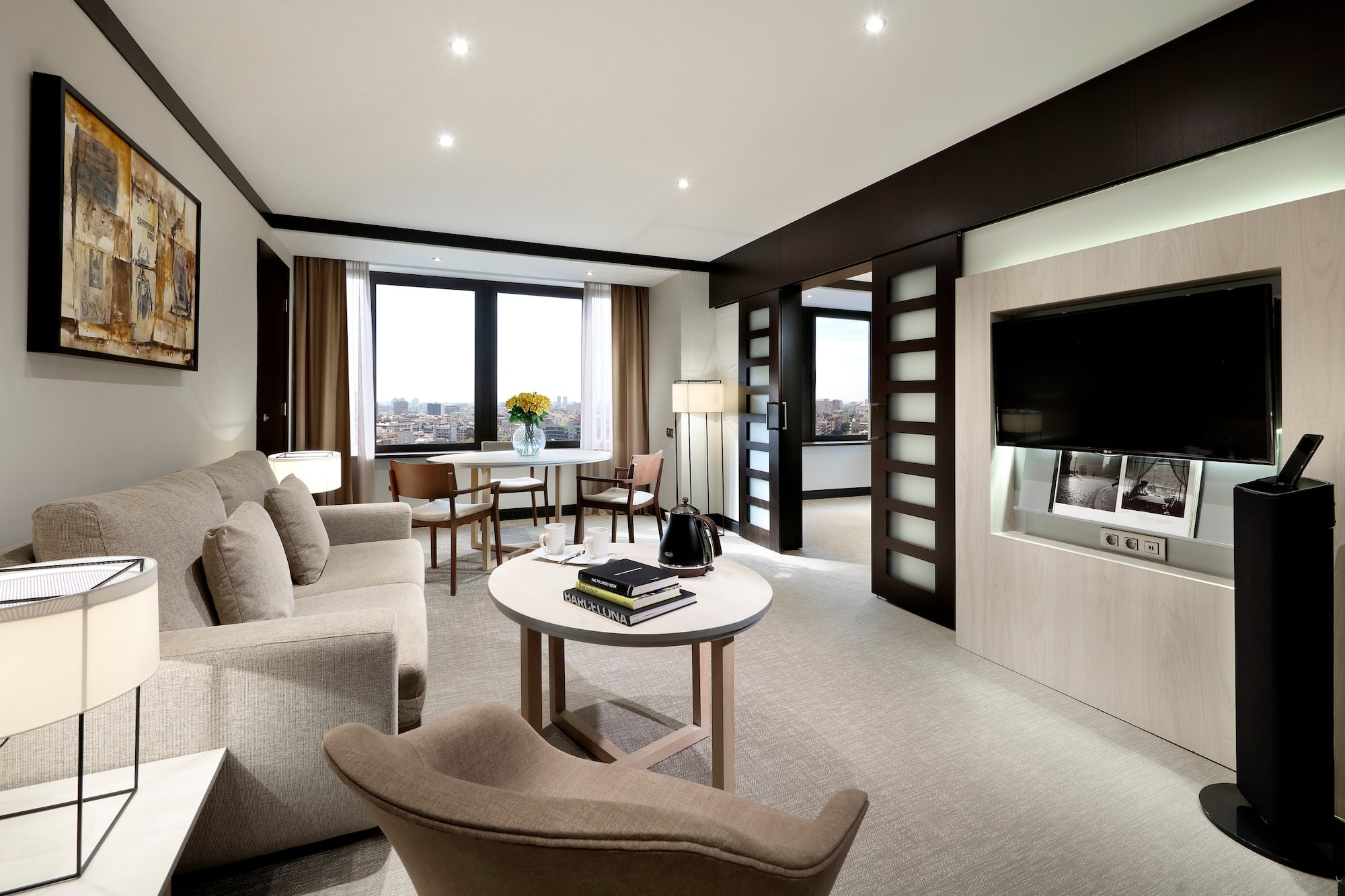 a living room with a television and a couch