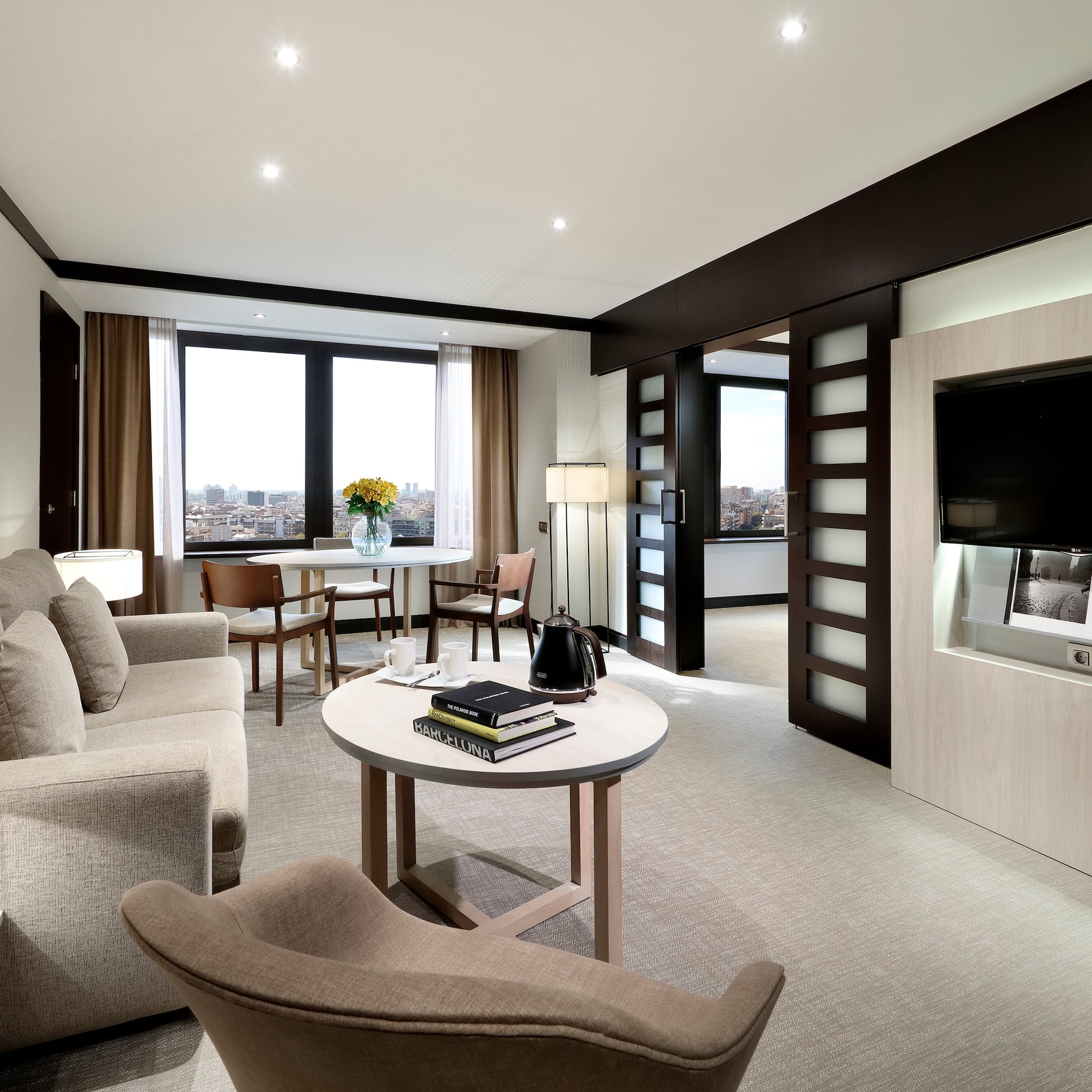 a living room with a television and a couch