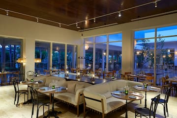 a room with tables and chairs