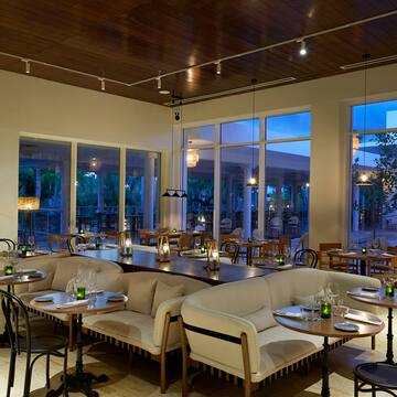 a room with tables and chairs