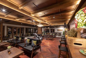 a room with chairs and tables