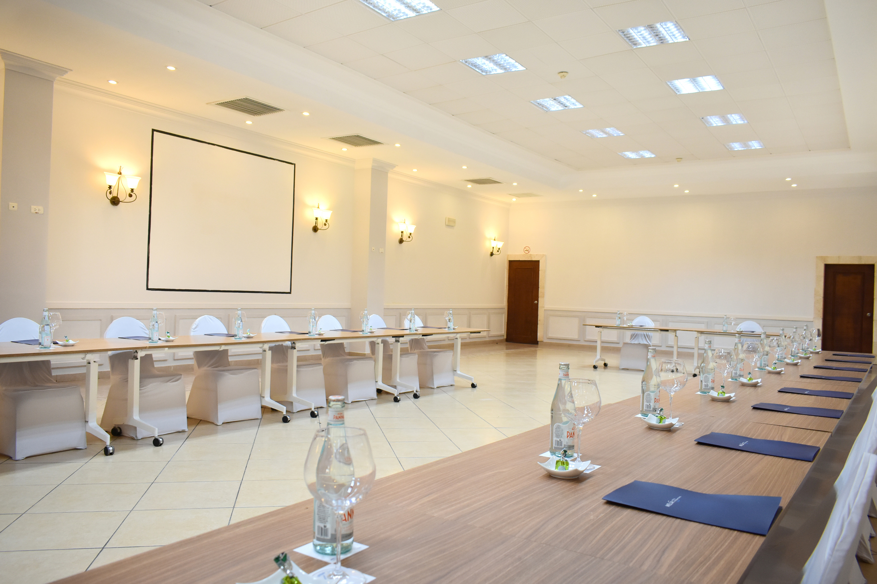 a room with tables and chairs