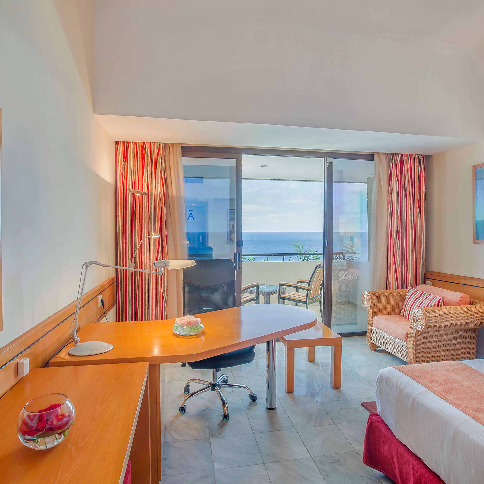 a room with a bed and a desk