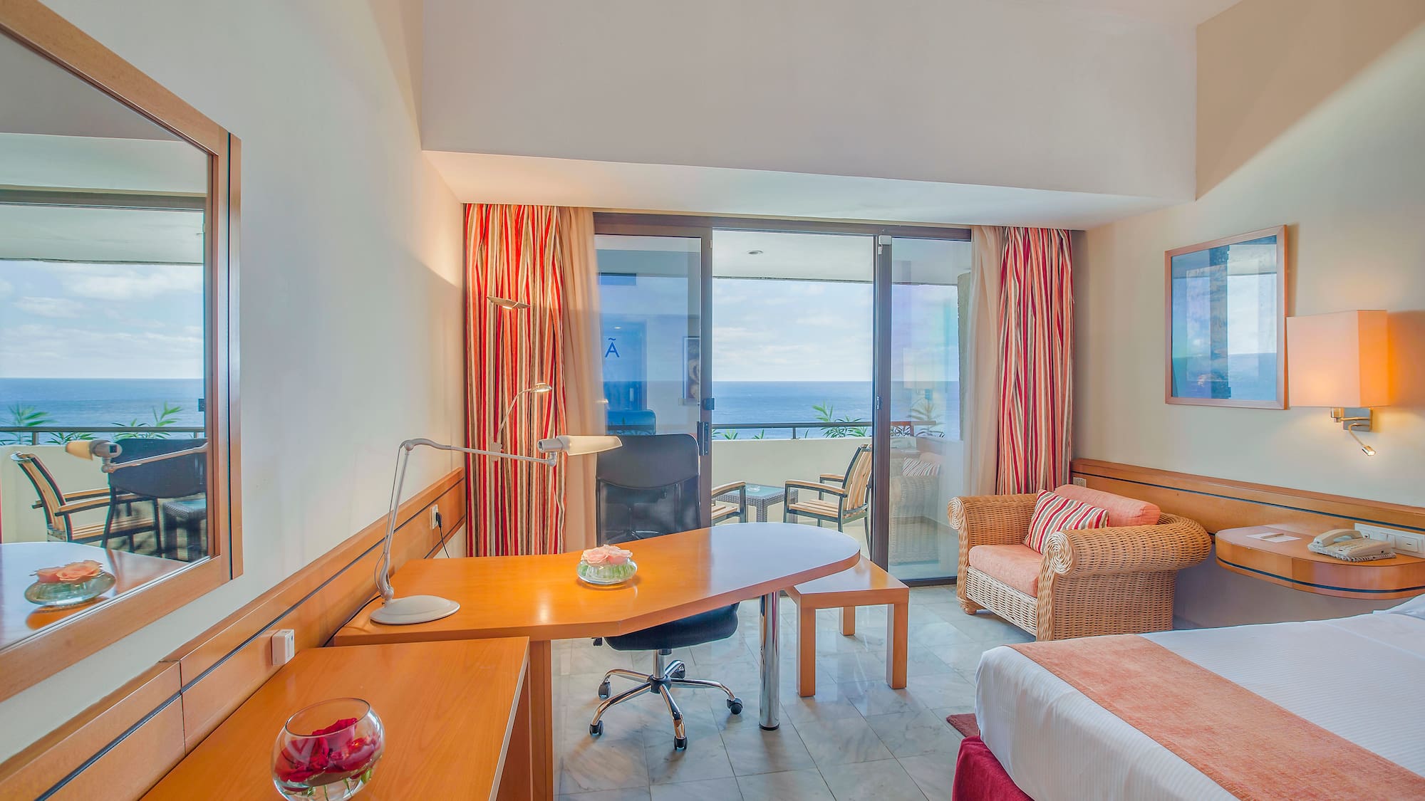 a room with a bed and a desk