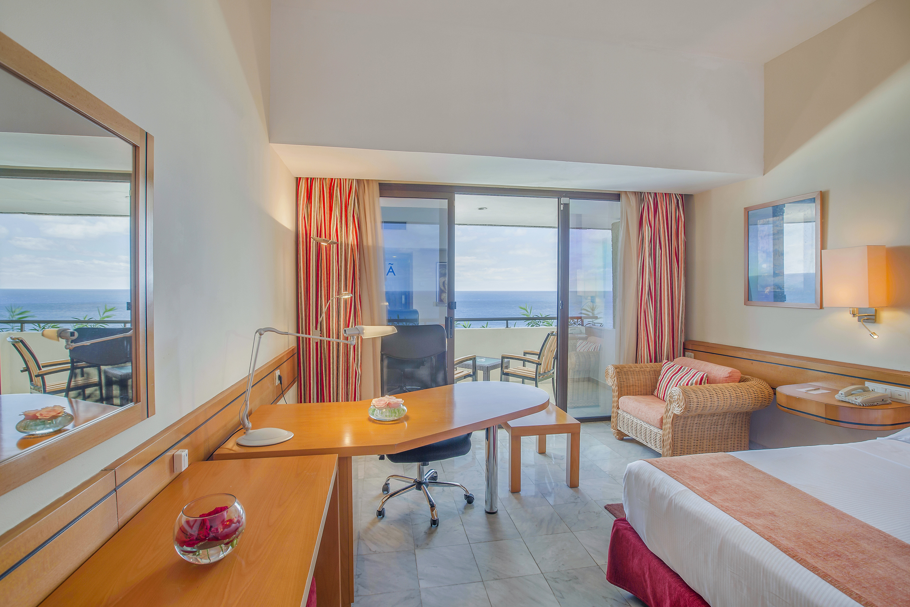 a room with a bed and a desk