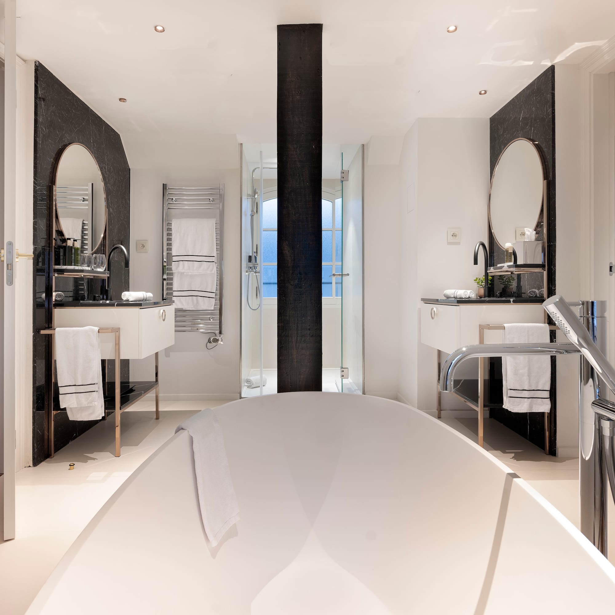 a bathroom with a tub and sink