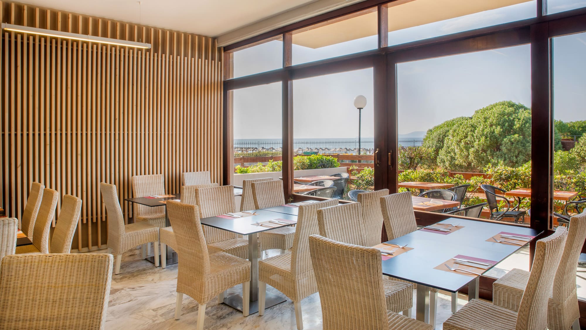 a room with tables and chairs