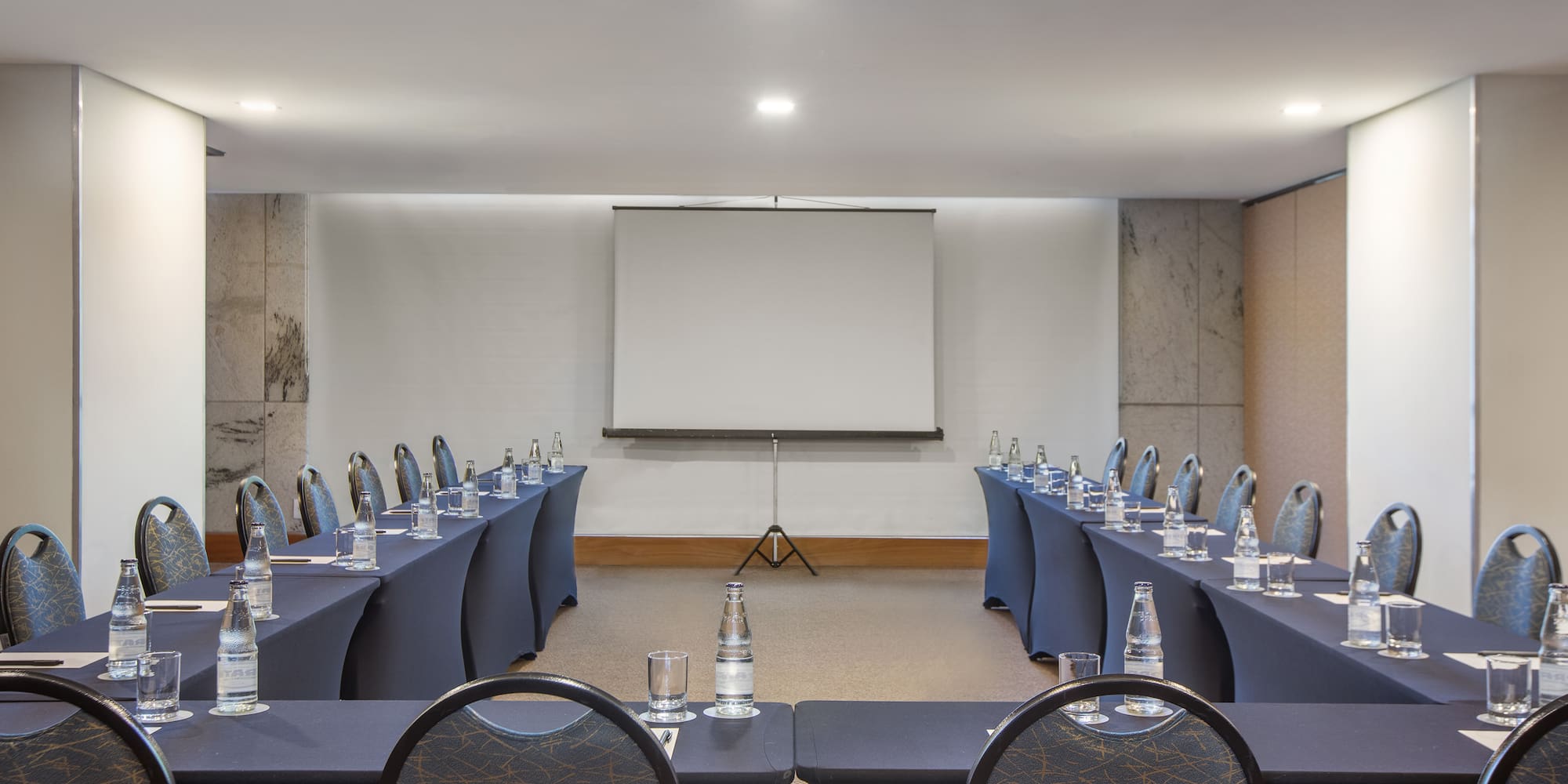 a room with tables and chairs