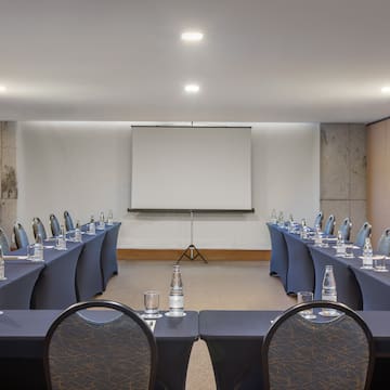 a room with tables and chairs
