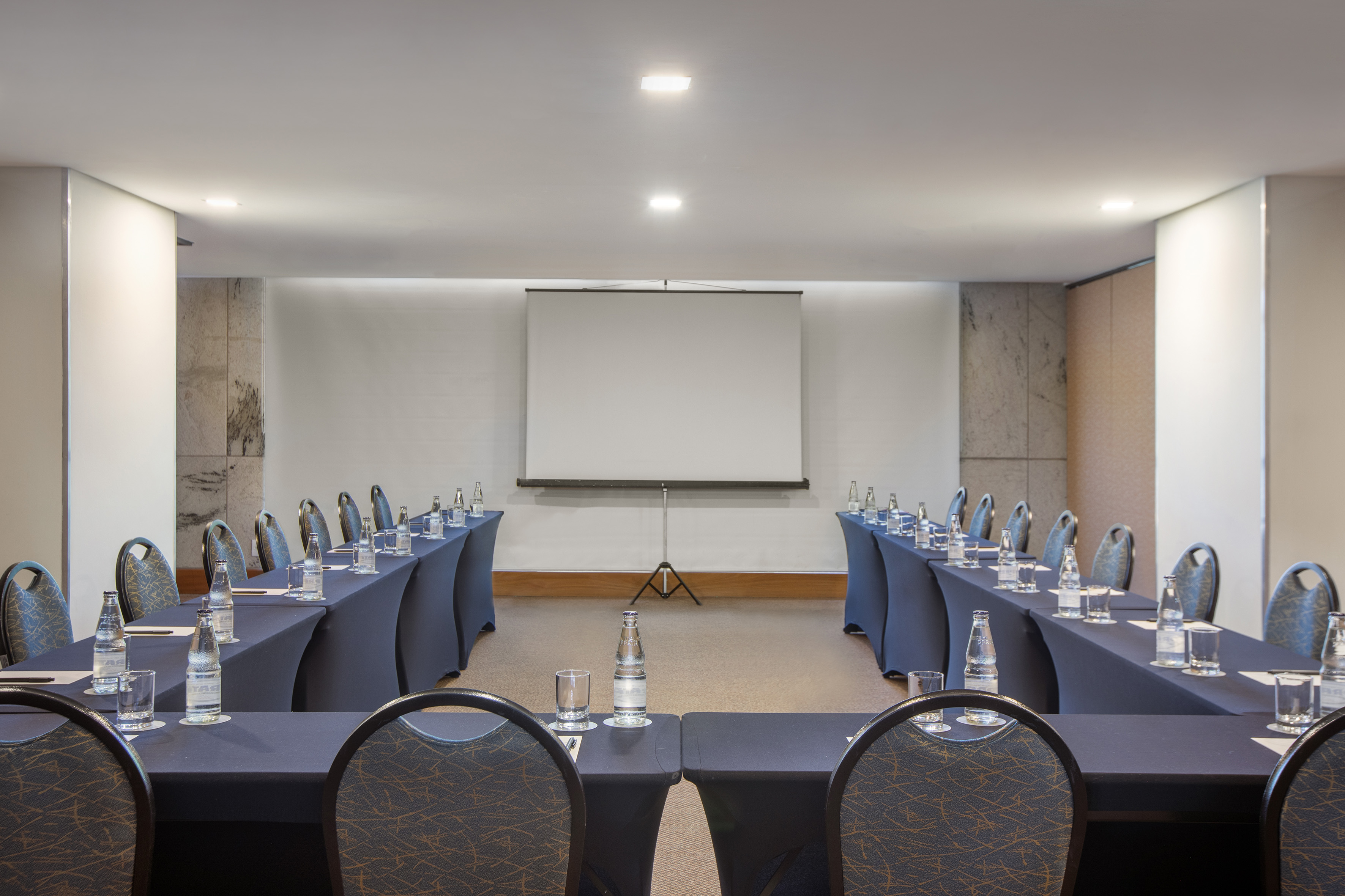 a room with tables and chairs
