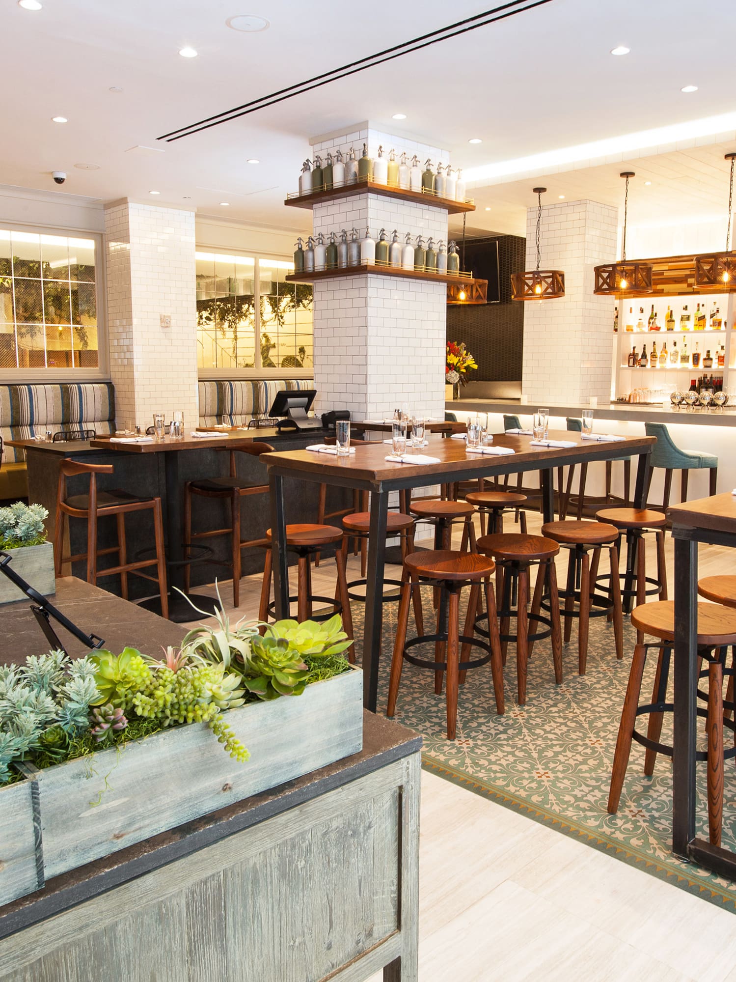 a restaurant with tables and chairs