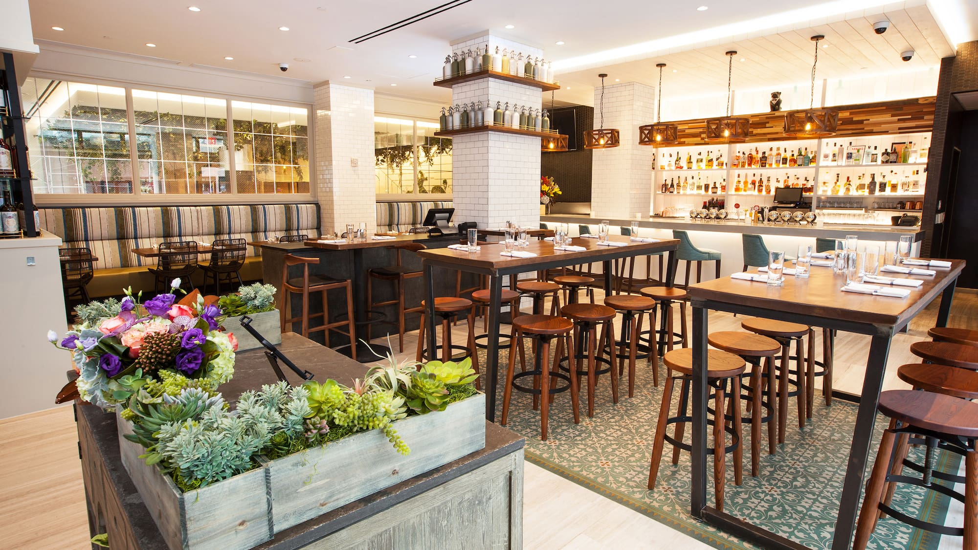 a restaurant with tables and chairs