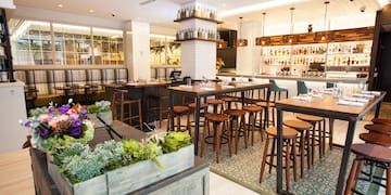 a restaurant with tables and chairs
