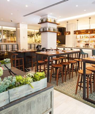 a restaurant with tables and chairs