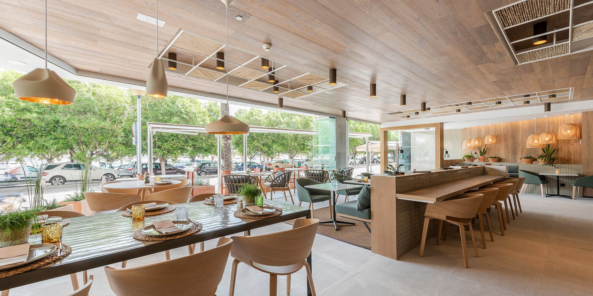 a restaurant with tables and chairs