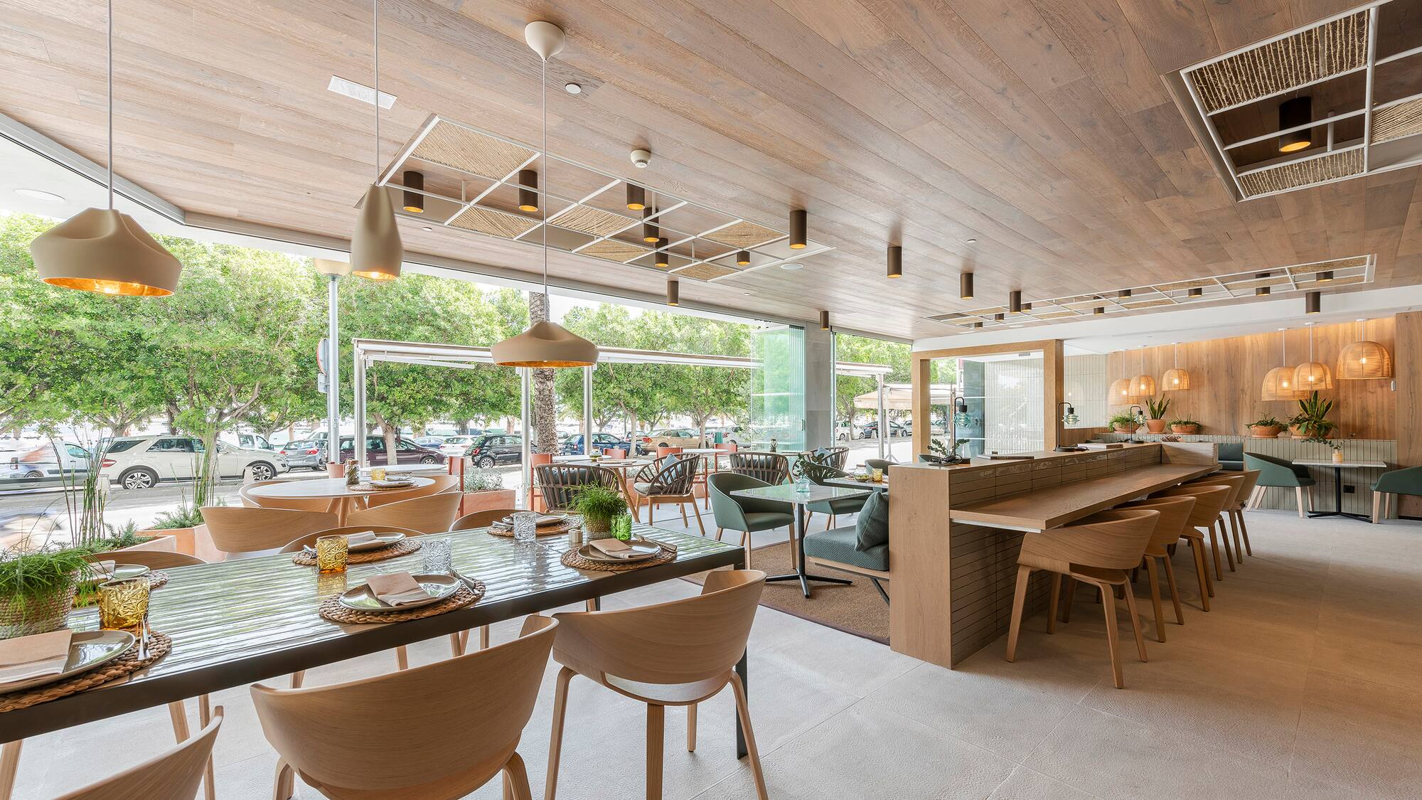 a restaurant with tables and chairs