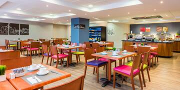 a room with tables and chairs