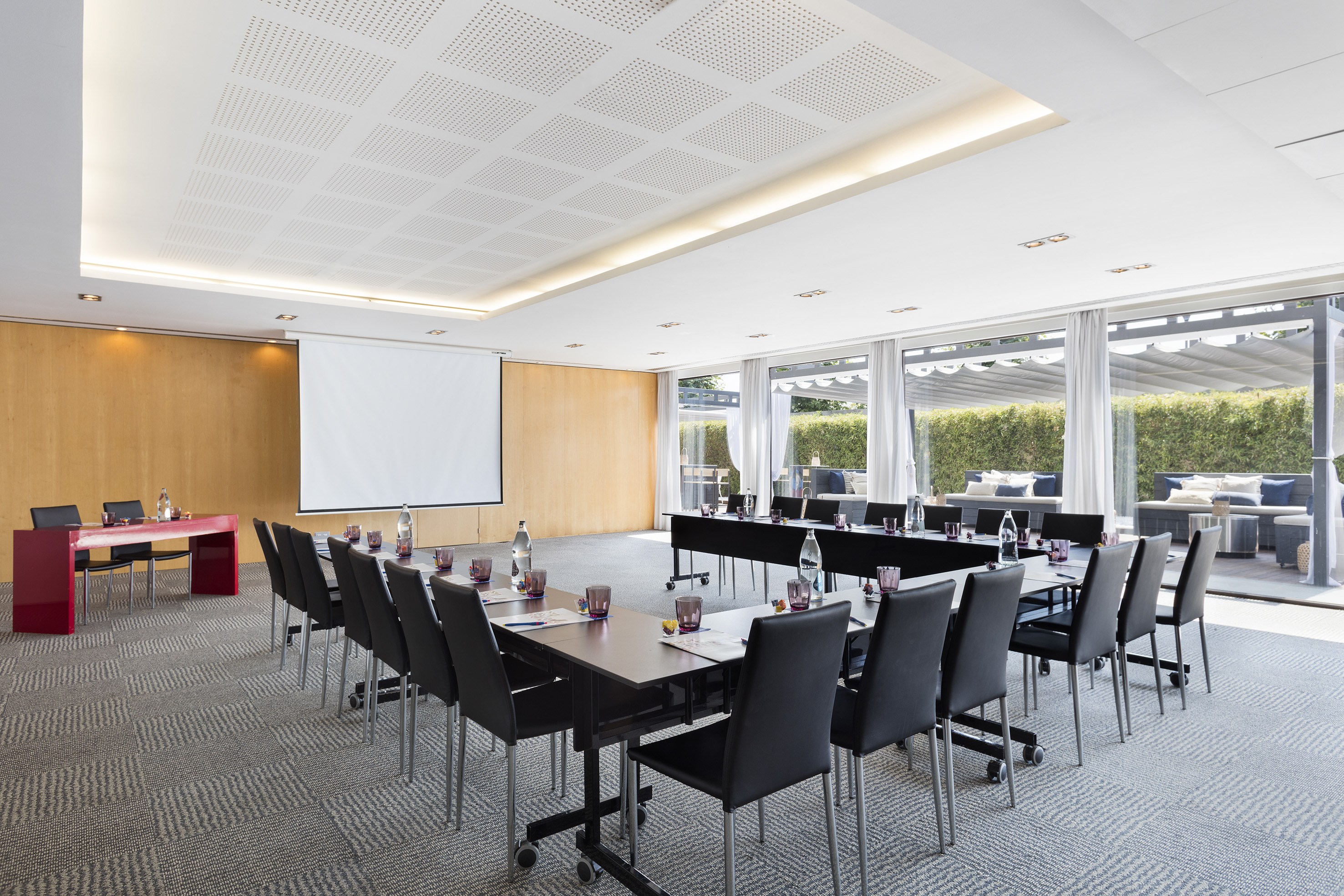 a room with a large table and chairs