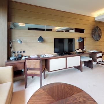 a room with a television and a table