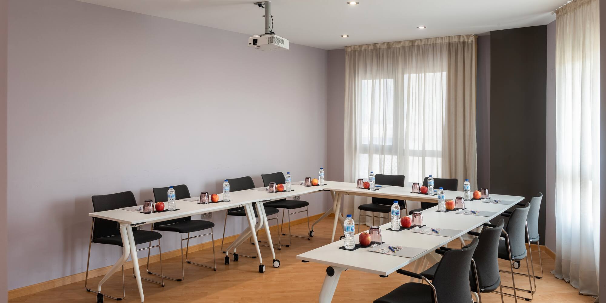a room with tables and chairs