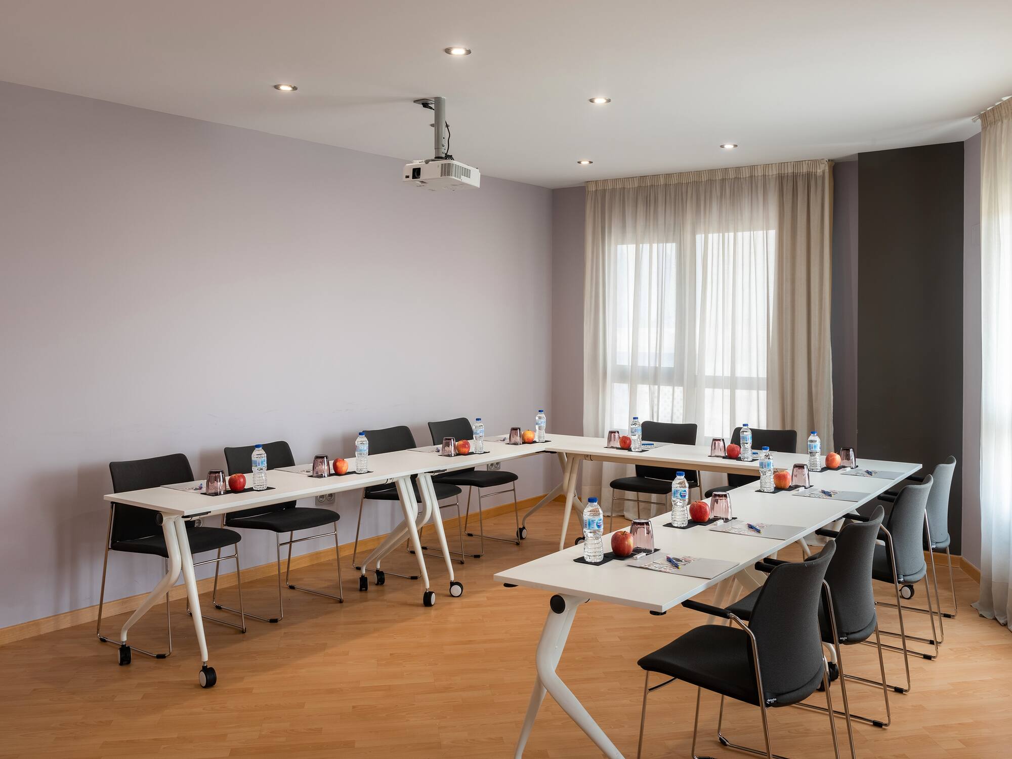 a room with tables and chairs
