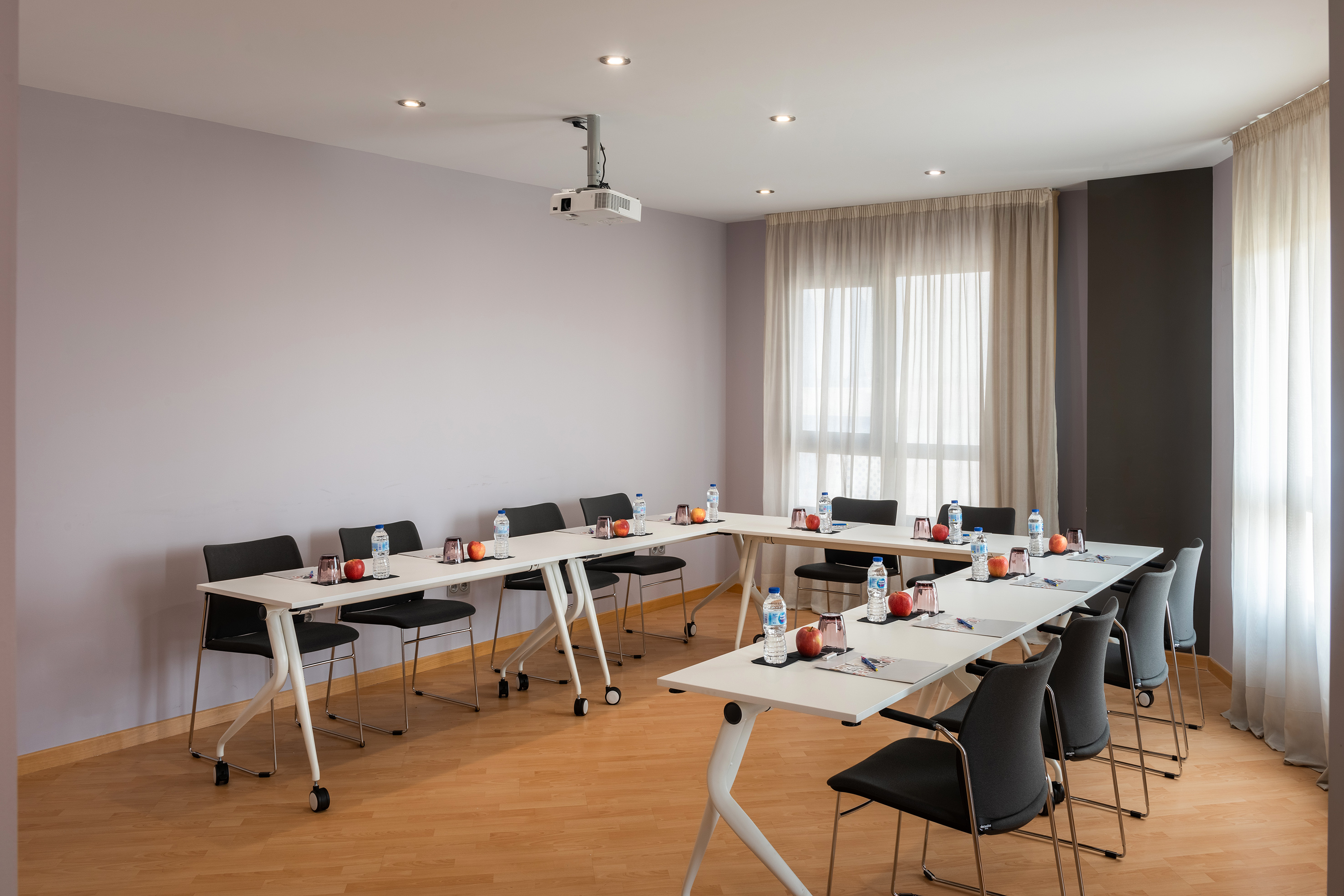 a room with tables and chairs
