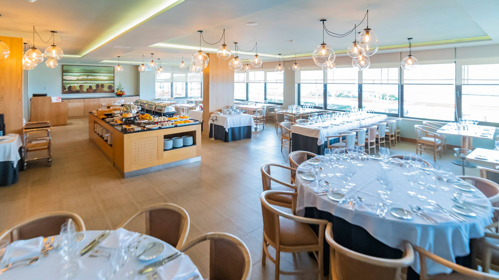 a room with tables and chairs