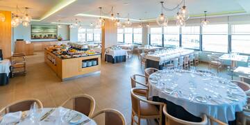 a room with tables and chairs