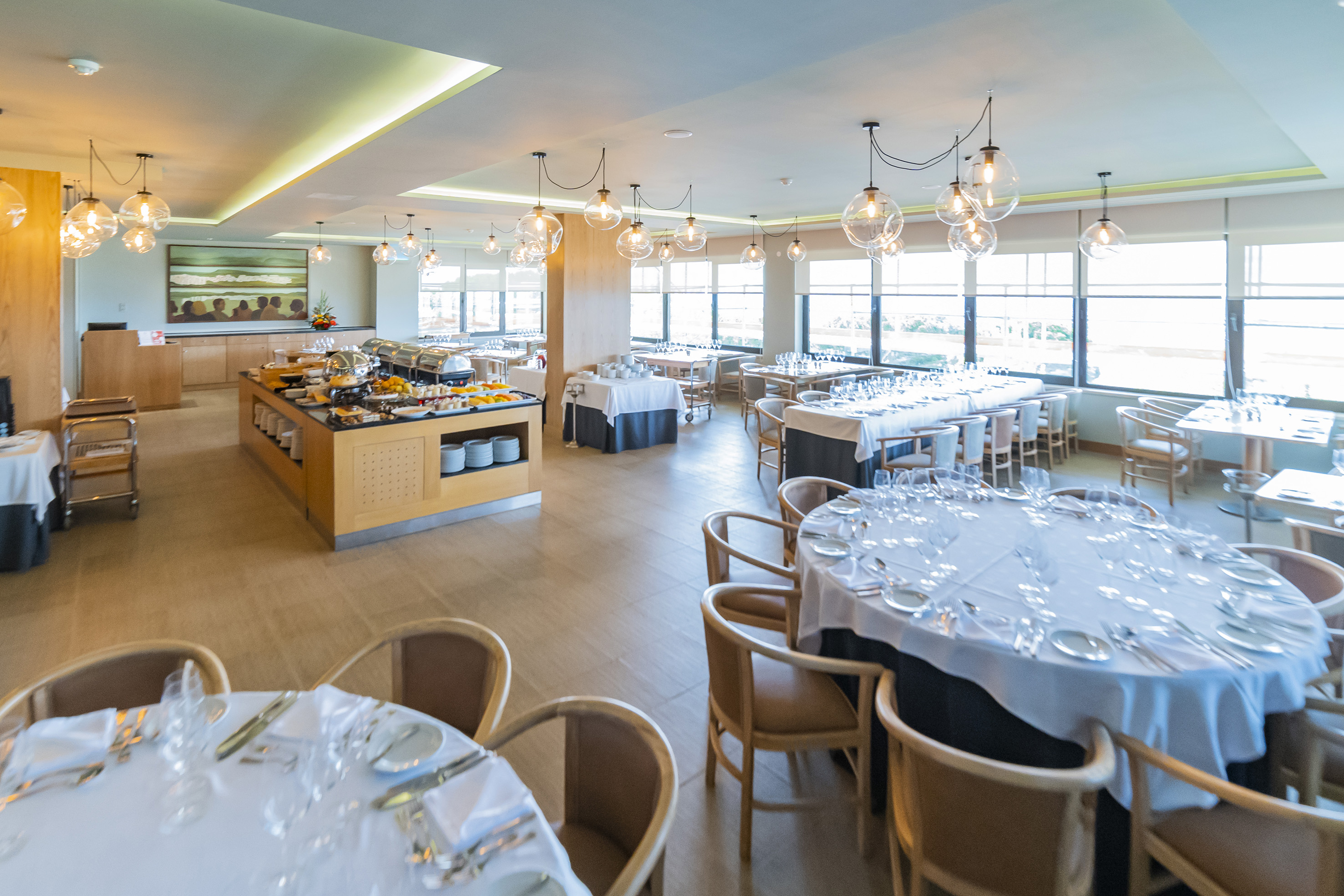 a room with tables and chairs