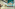 Modern hotel lobby with teal feature wall, sputnik chandeliers, and polished floors.