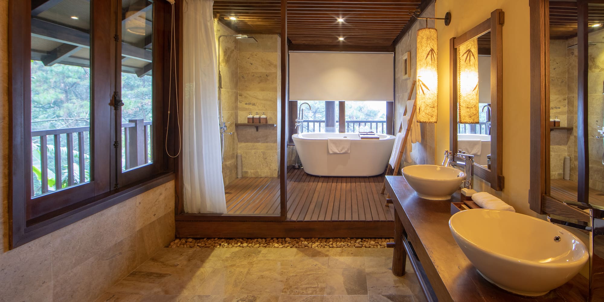 a bathroom with a tub and a shower