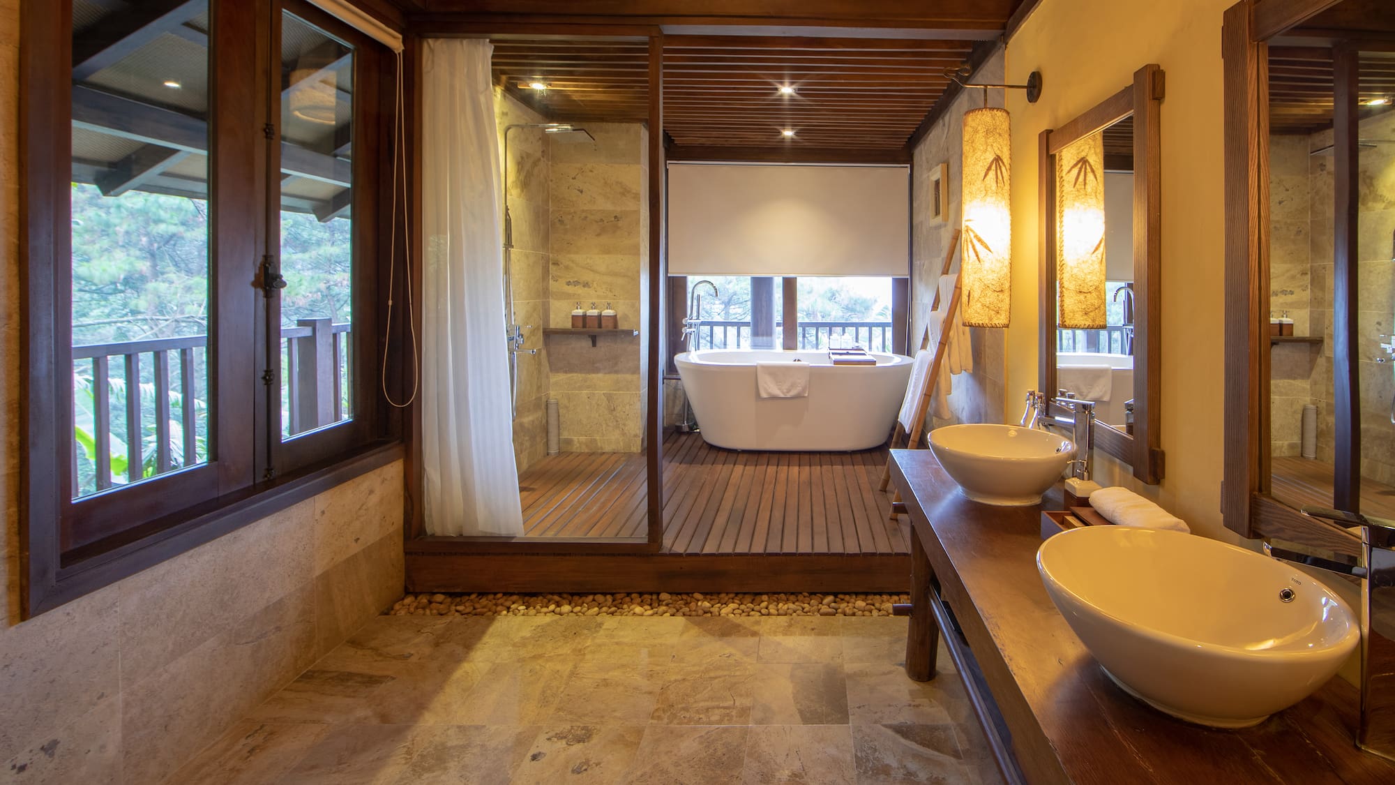 a bathroom with a tub and a shower